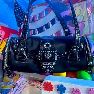 Cute little black purse for all events! Hurry and enjoy as much as I have!